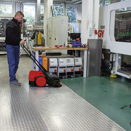 Bissell® 31 inch Battery Powered Push Sweeper In Action Thumbnail