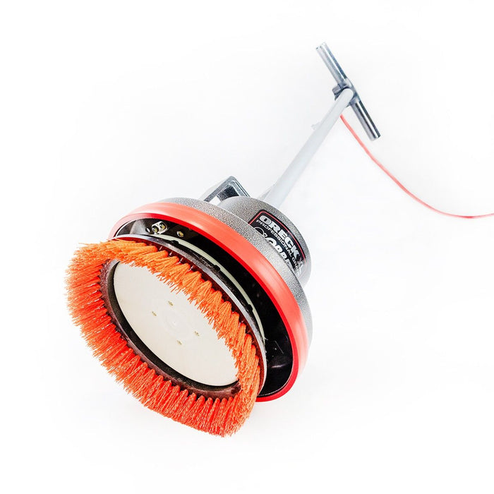 Underneath View of the Oreck® Orbiter® 12" Orange Aggressive Floor Scrubbing Brush (#237047) on Floor Buffer