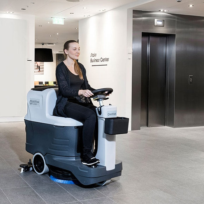Advance SC2000™ 20 inch Compact Ride on Floor Scrubber in Use