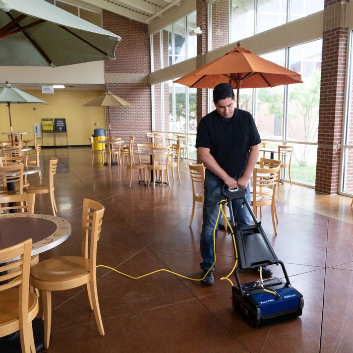 Powr-Flite Multiwash Scrubbing a Floor